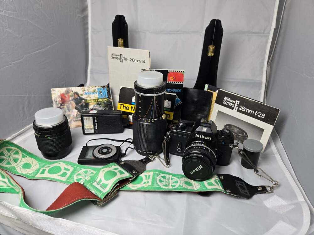Nikon EM 35mm Film Camera Kit with 28mm, 50mm, 70-210mm Series E Lenses, SB-E Fl
